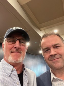 Alan Lafferty and David Pepper gently smile for a selfie.